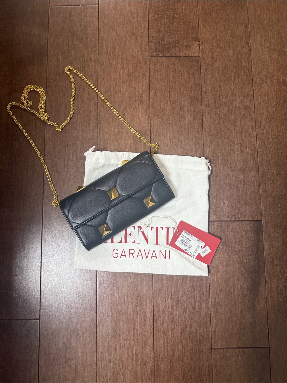 Valentino Garavani Black Leather Crossbody Wallet with Gold Rockstuds